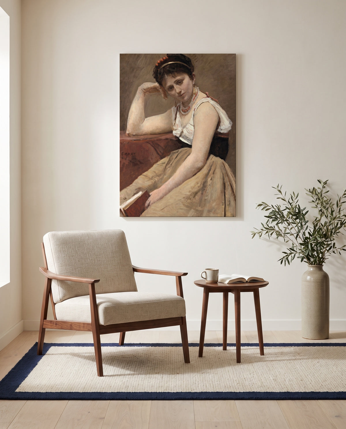 Interrupted Reading by Camille Corot as a stretched canvas above a linen lounge chair in a reading corner