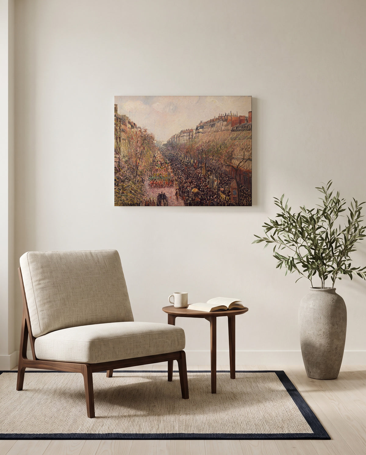 Boulevard Montmartre, Mardi Gras by Camille Pissarro as a stretched canvas above a linen lounge chair in a reading corner