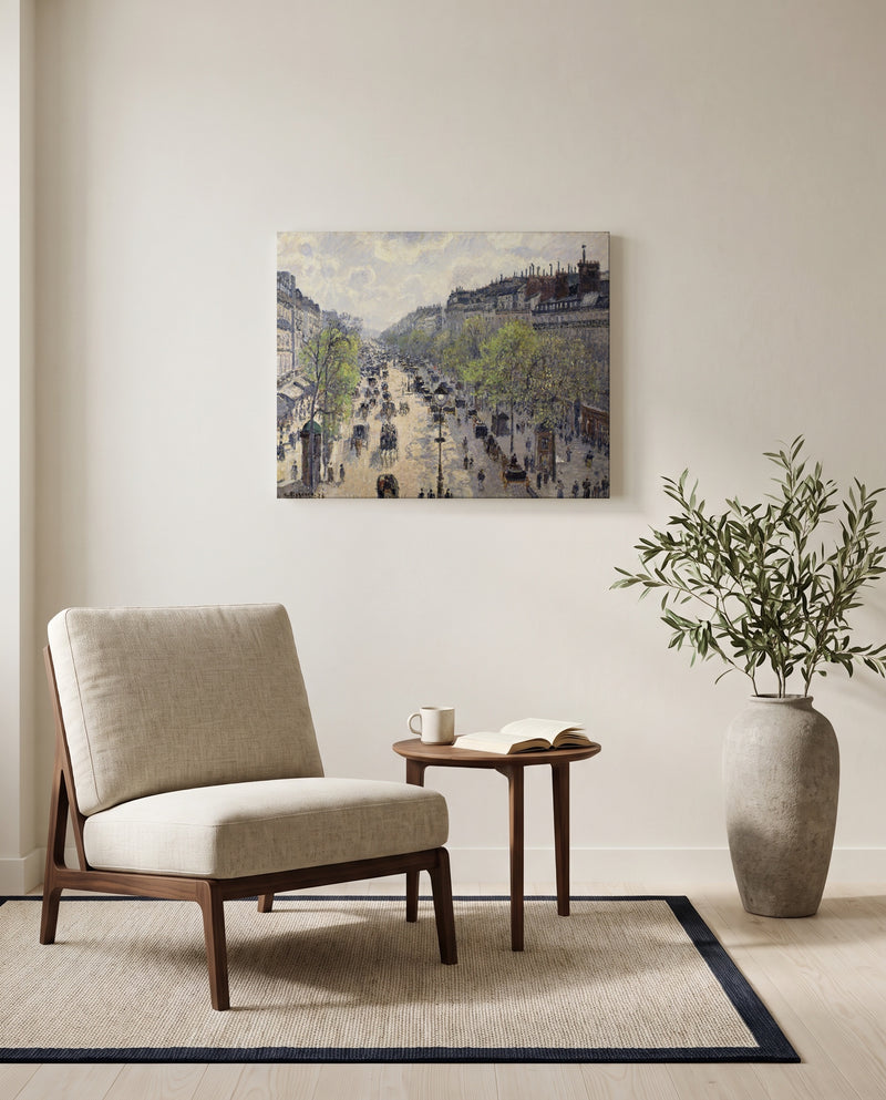 Boulevard Montmartre, Spring by Camille Pissarro as a stretched canvas above a linen lounge chair in a reading corner