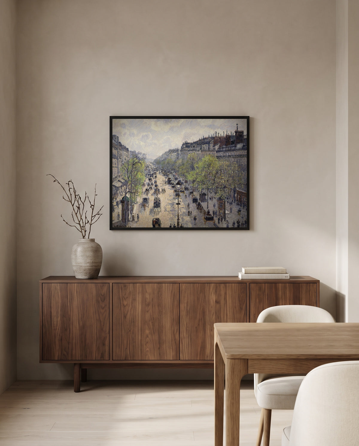 Boulevard Montmartre, Spring by Camille Pissarro in a black frame above a walnut sideboard in a dining room