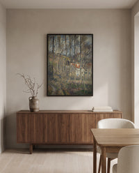 The Côte des Bœufs by Camille Pissarro in a black frame above a walnut sideboard in a dining room