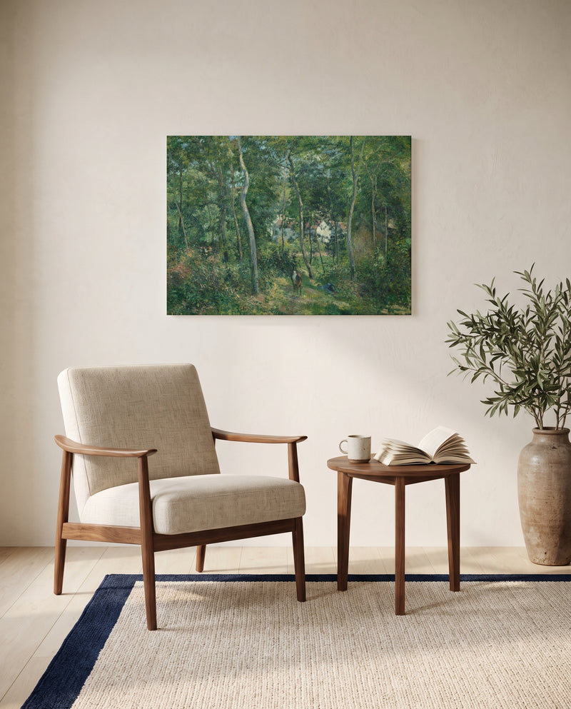 Edge of the Woods, L’Hermitage by Camille Pissarro as a stretched canvas above a linen lounge chair in a reading corner
