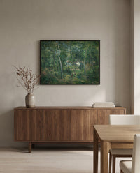 Edge of the Woods, L’Hermitage by Camille Pissarro in a black frame above a walnut sideboard in a dining room