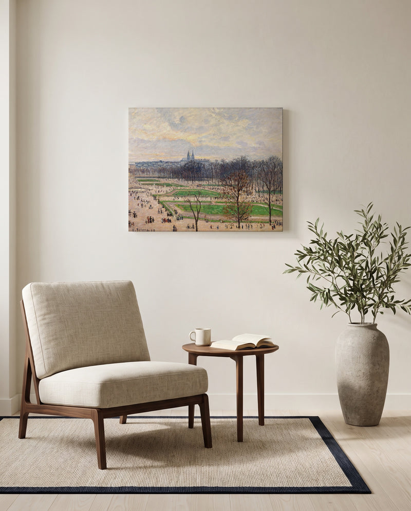 The Tuileries, Winter Afternoon by Camille Pissarro as a stretched canvas above a linen lounge chair in a reading corner