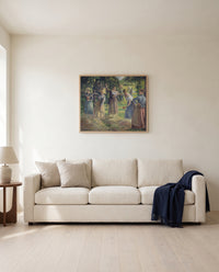 Hay Harvest at Éragny by Camille Pissarro framed in natural oak above a cream sofa in a warm living room