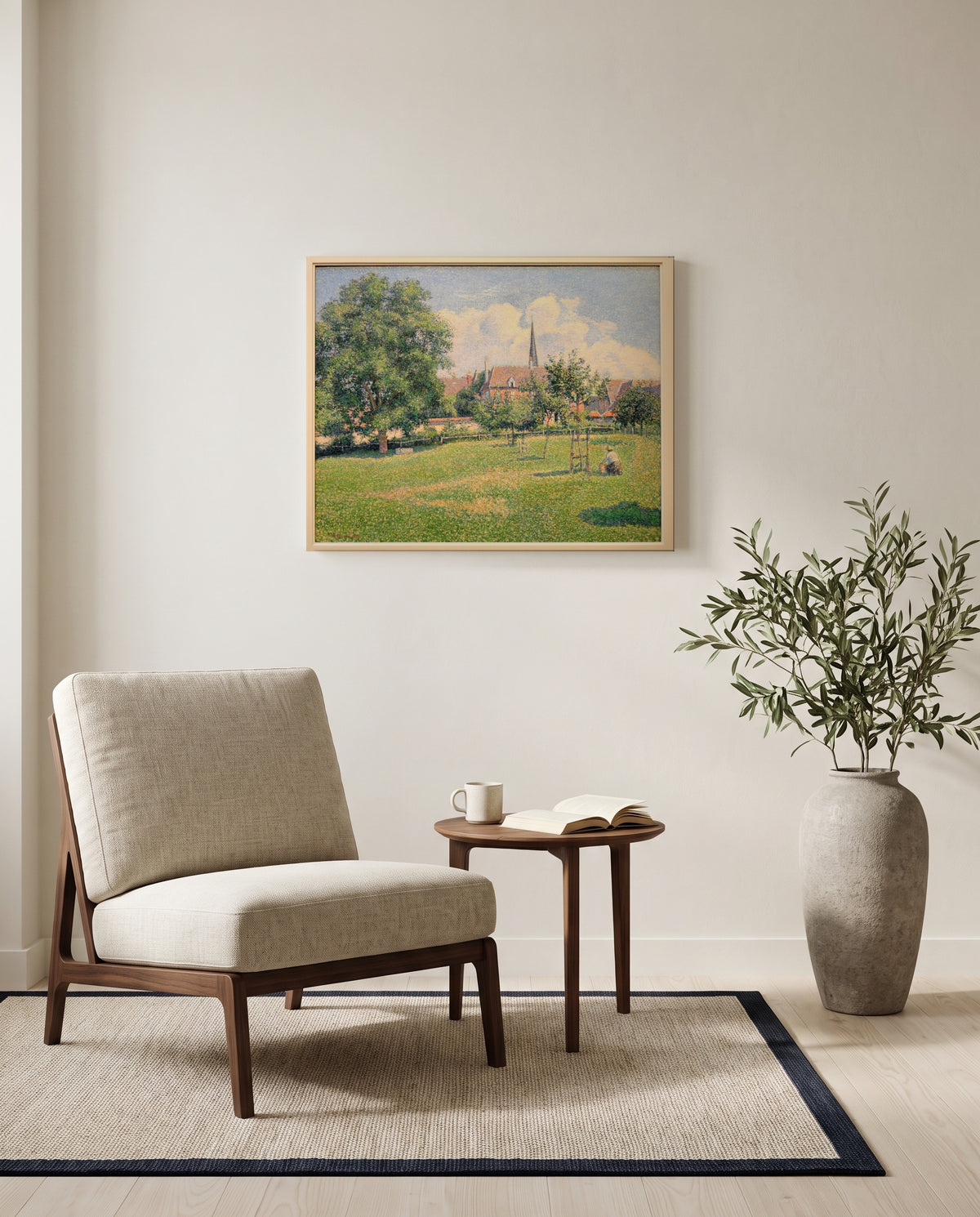 The House of the Deaf Woman by Camille Pissarro as a stretched canvas above a linen lounge chair in a reading corner