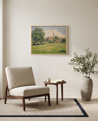 The House of the Deaf Woman by Camille Pissarro as a stretched canvas above a linen lounge chair in a reading corner