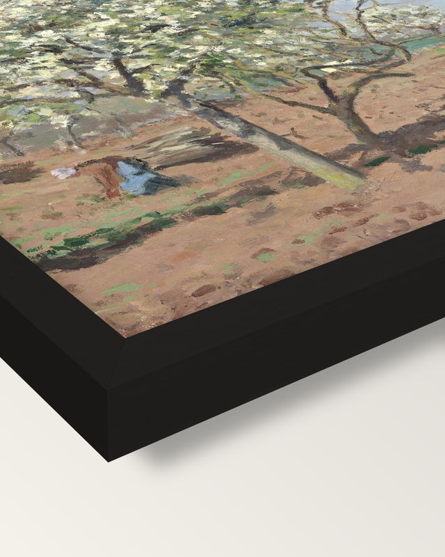 Orchard in Bloom by Camille Pissarro framed print, corner close-up: black moulding, mitred, the print set just below its edge