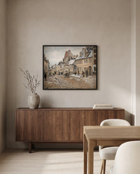 Road to Gisors, Winter by Camille Pissarro in a black frame above a walnut sideboard in a dining room