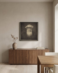 Self-Portrait by Camille Pissarro in a black frame above a walnut sideboard in a dining room