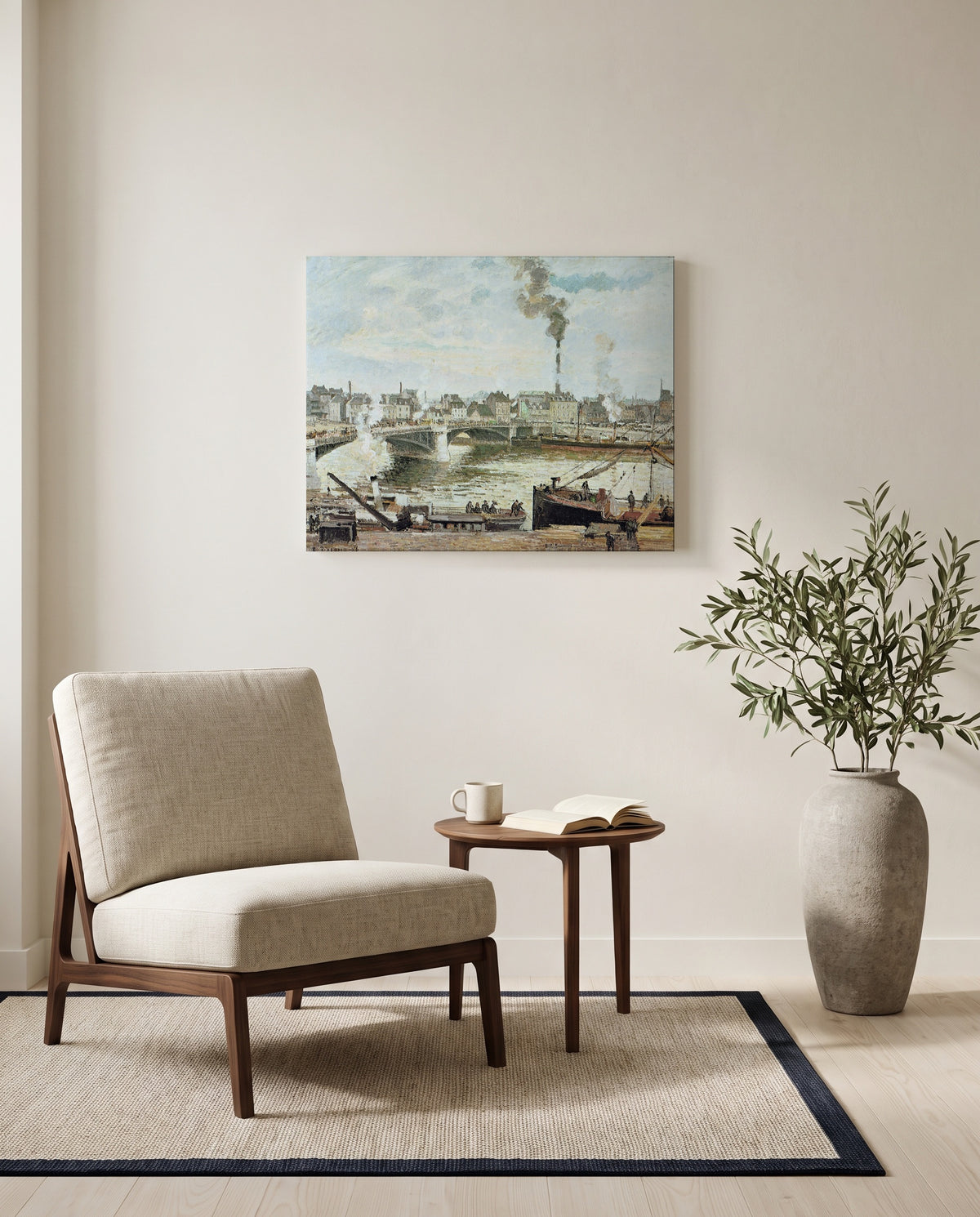 The Great Bridge, Rouen by Camille Pissarro as a stretched canvas above a linen lounge chair in a reading corner