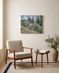 The Harvest, Pontoise by Camille Pissarro as a stretched canvas above a linen lounge chair in a reading corner