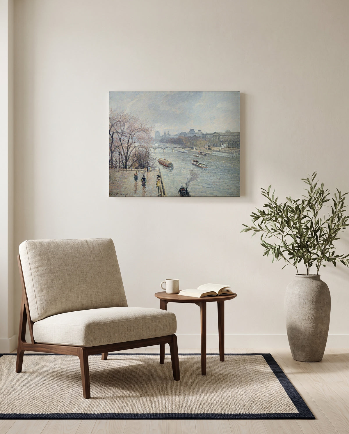 The Louvre, Rainy Weather by Camille Pissarro as a stretched canvas above a linen lounge chair in a reading corner
