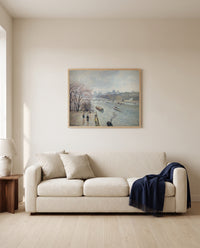The Louvre, Rainy Weather by Camille Pissarro framed in natural oak above a cream sofa in a warm living room