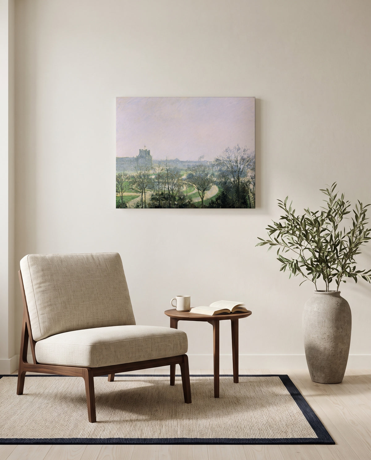Tuileries Gardens by Camille Pissarro as a stretched canvas above a linen lounge chair in a reading corner