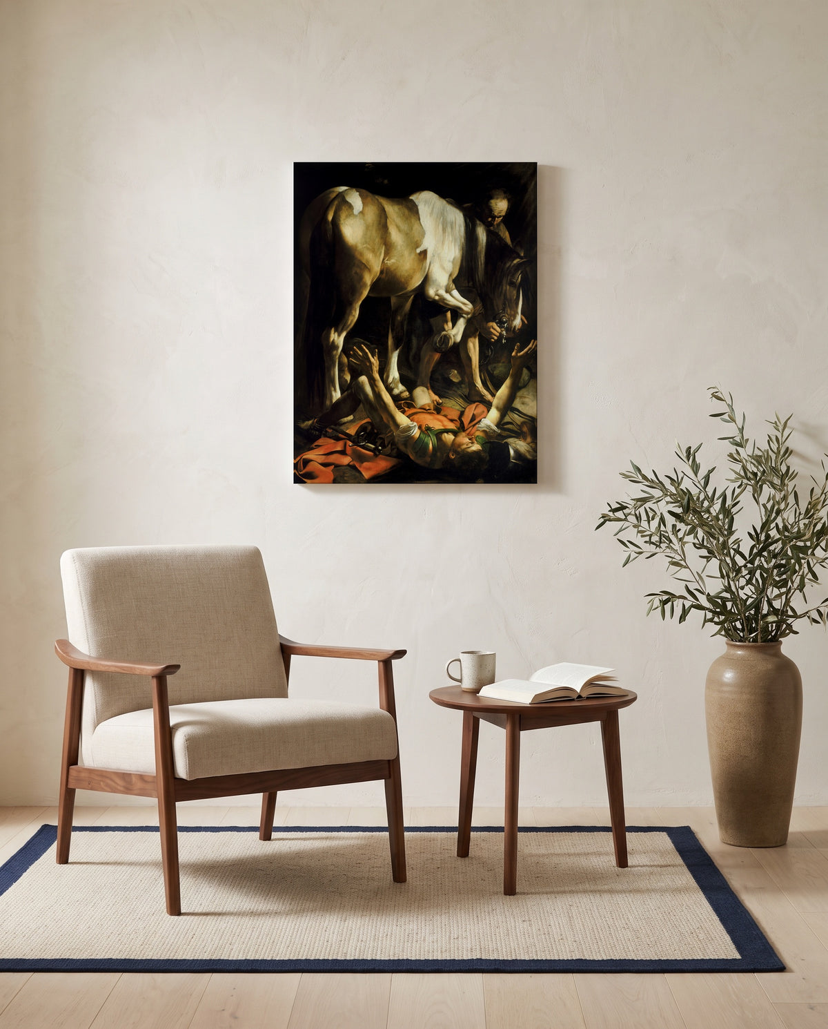 The Conversion of Saul by Caravaggio as a stretched canvas above a linen lounge chair in a reading corner