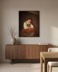 Penitent Magdalene by Caravaggio in a black frame above a walnut sideboard in a dining room