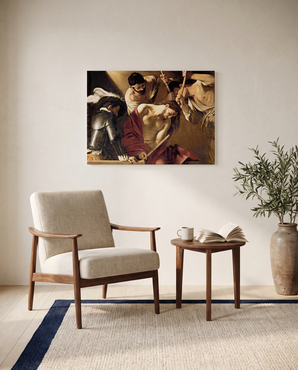 The Crowning with Thorns by Caravaggio as a stretched canvas above a linen lounge chair in a reading corner