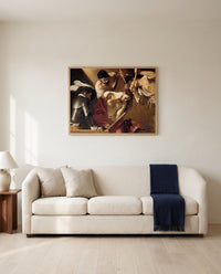 The Crowning with Thorns by Caravaggio framed in natural oak above a cream sofa in a warm living room
