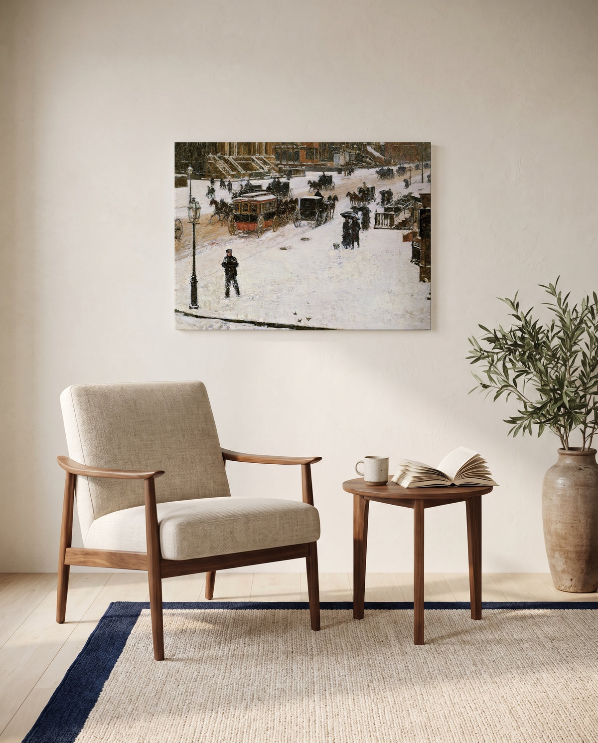 Fifth Avenue in Winter by Childe Hassam as a stretched canvas above a linen lounge chair in a reading corner