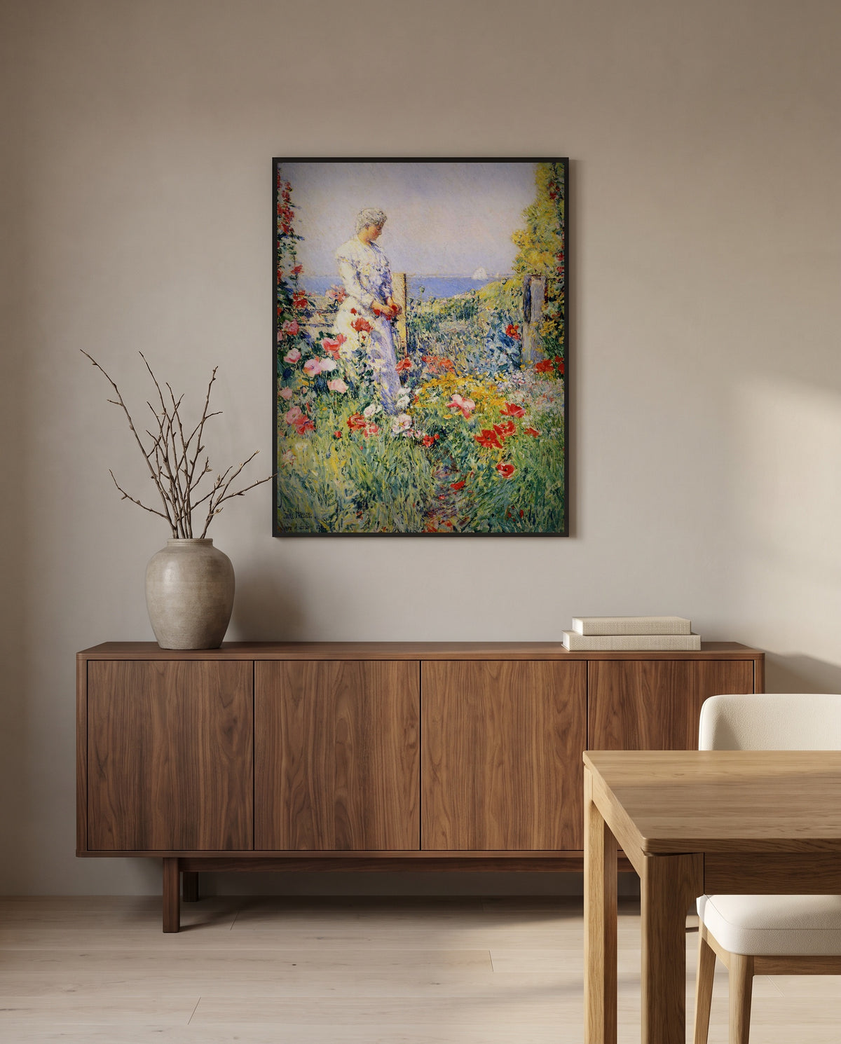In the Garden by Childe Hassam in a black frame above a walnut sideboard in a dining room