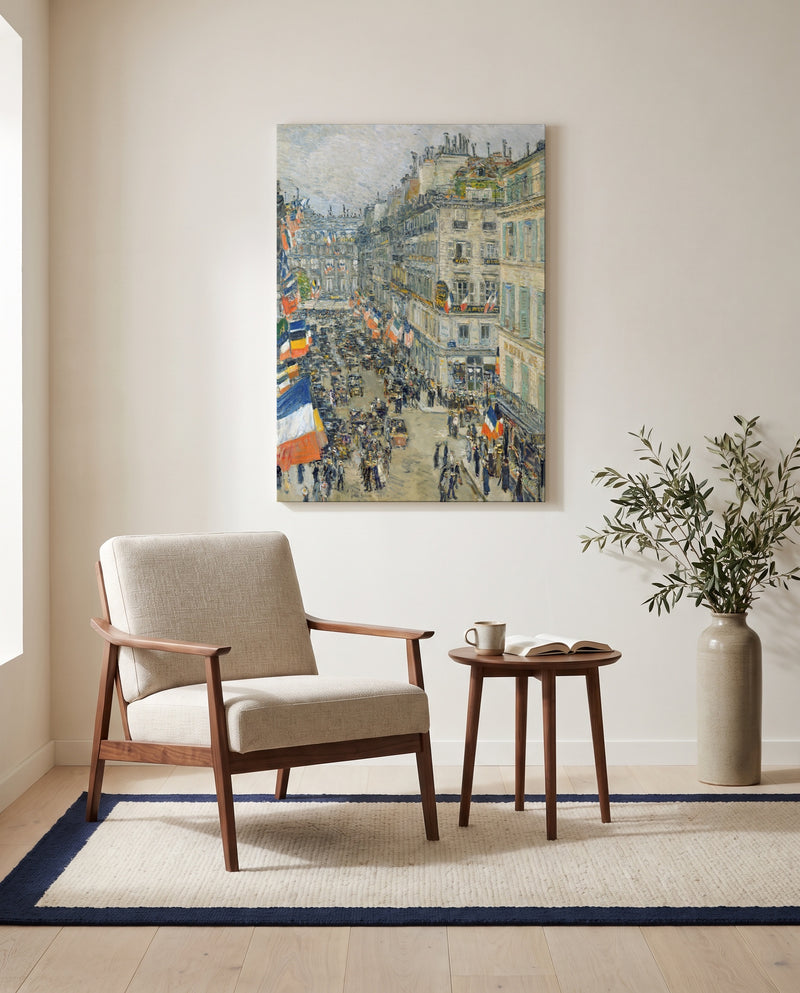 July Fourteenth, Rue Daunou by Childe Hassam as a stretched canvas above a linen lounge chair in a reading corner