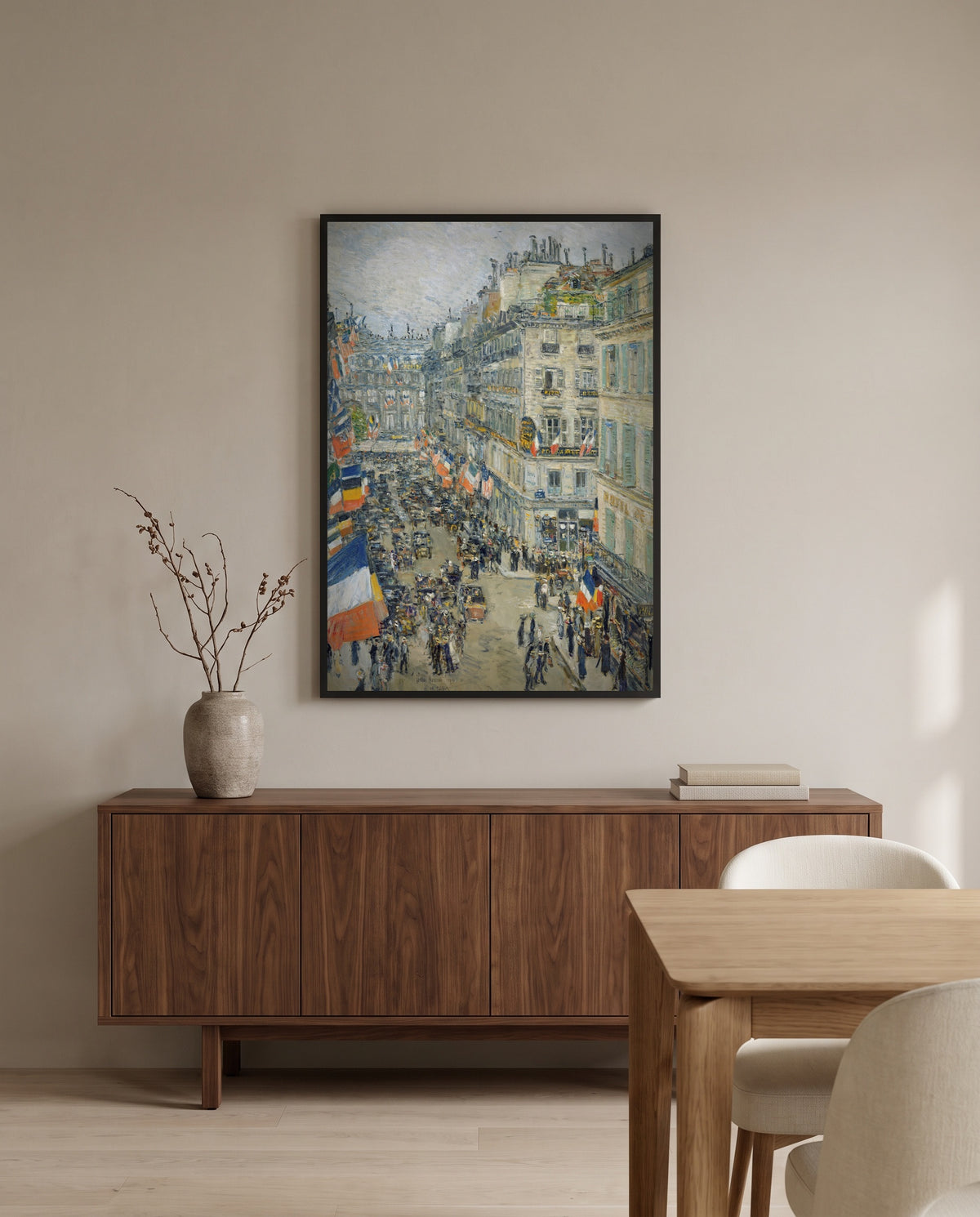 July Fourteenth, Rue Daunou by Childe Hassam in a black frame above a walnut sideboard in a dining room