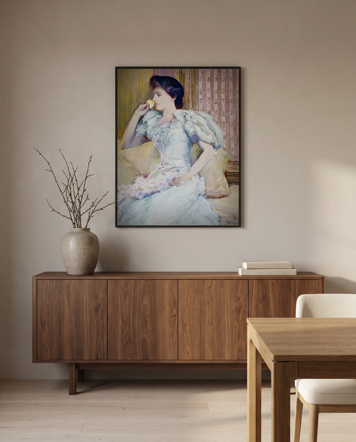 Lillie Langtry by Childe Hassam in a black frame above a walnut sideboard in a dining room