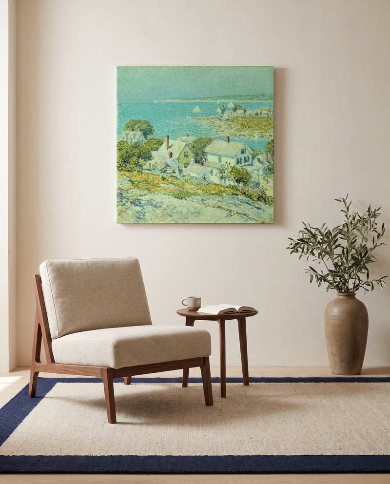 New England Headlands by Childe Hassam as a stretched canvas above a linen lounge chair in a reading corner