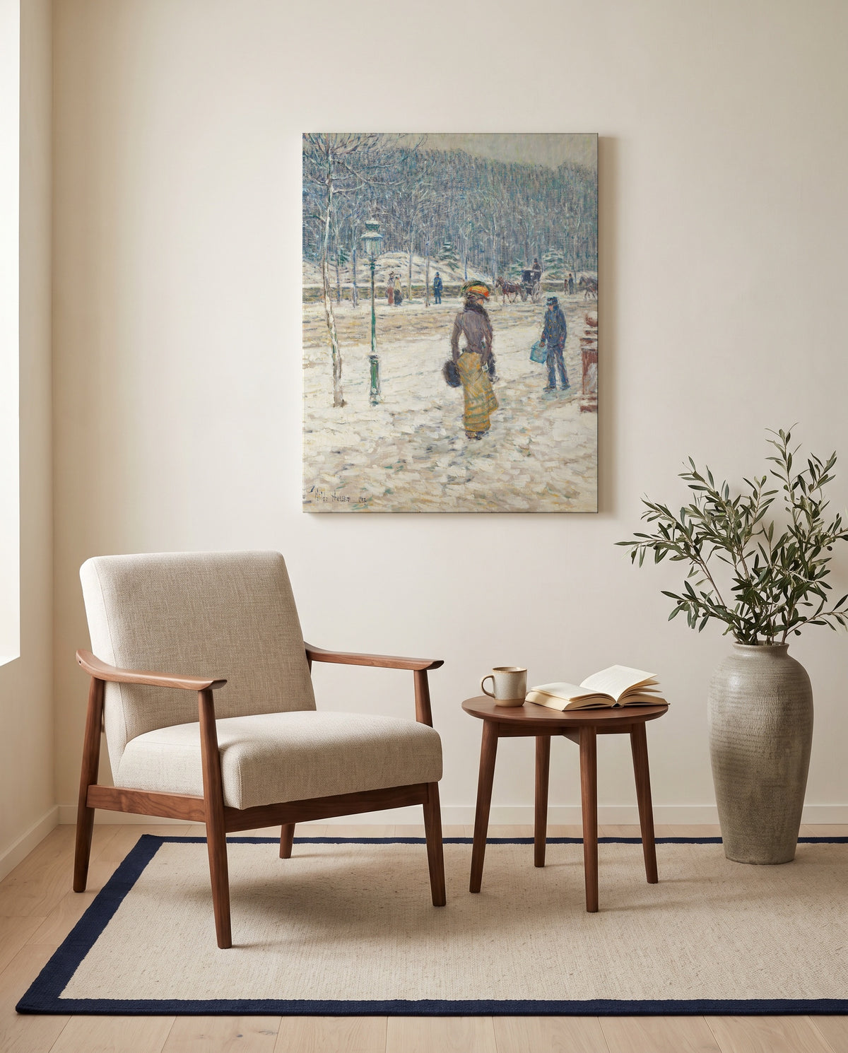 New York Street by Childe Hassam as a stretched canvas above a linen lounge chair in a reading corner