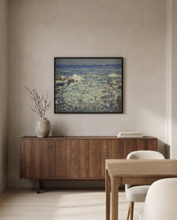 Surf, Isles of Shoals by Childe Hassam in a black frame above a walnut sideboard in a dining room