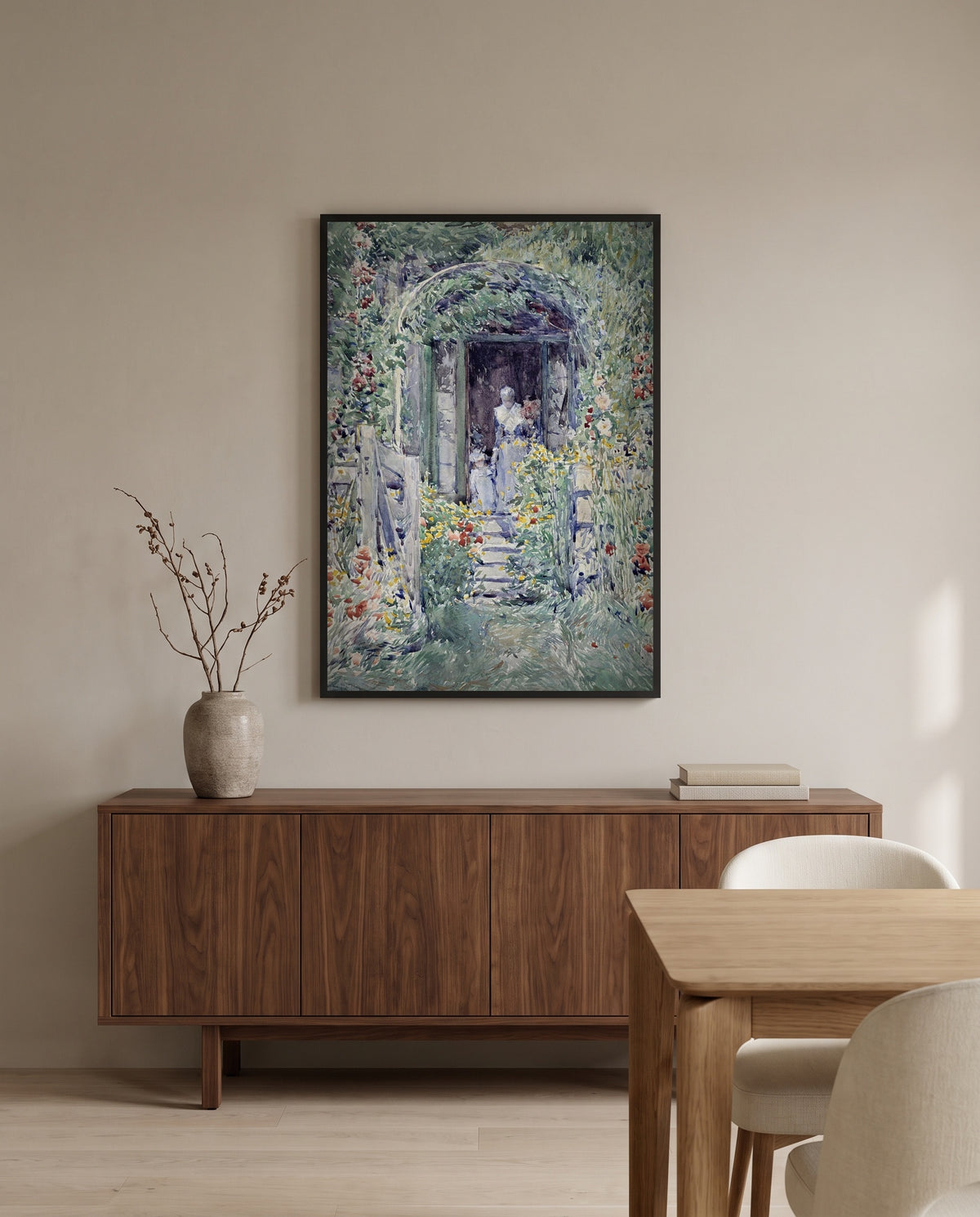 The Garden in Its Glory by Childe Hassam in a black frame above a walnut sideboard in a dining room