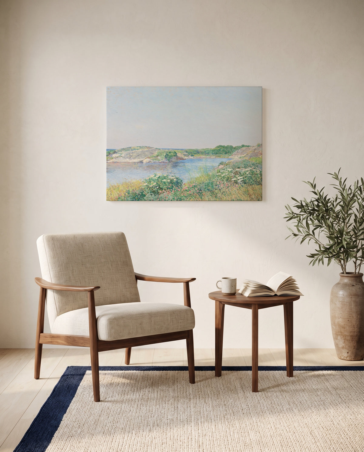 The Little Pond, Appledore by Childe Hassam as a stretched canvas above a linen lounge chair in a reading corner
