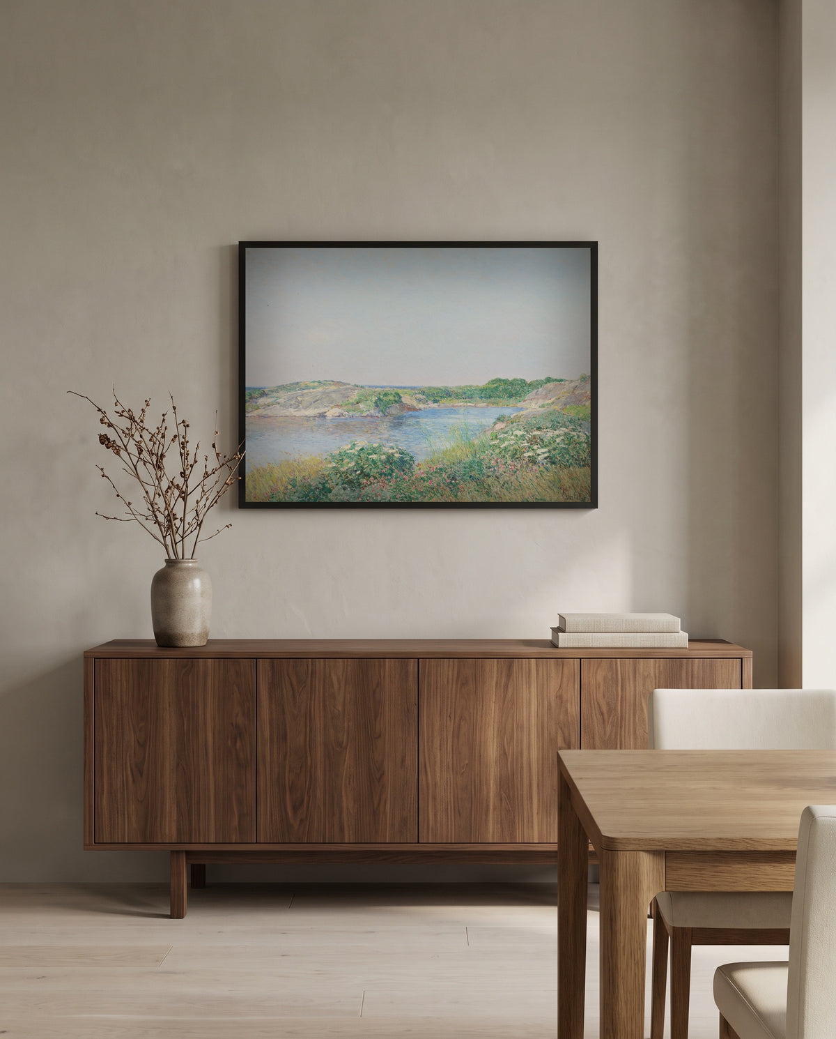 The Little Pond, Appledore by Childe Hassam in a black frame above a walnut sideboard in a dining room