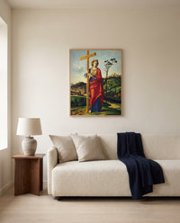 Saint Helena by Cima da Conegliano framed in natural oak above a cream sofa in a warm living room