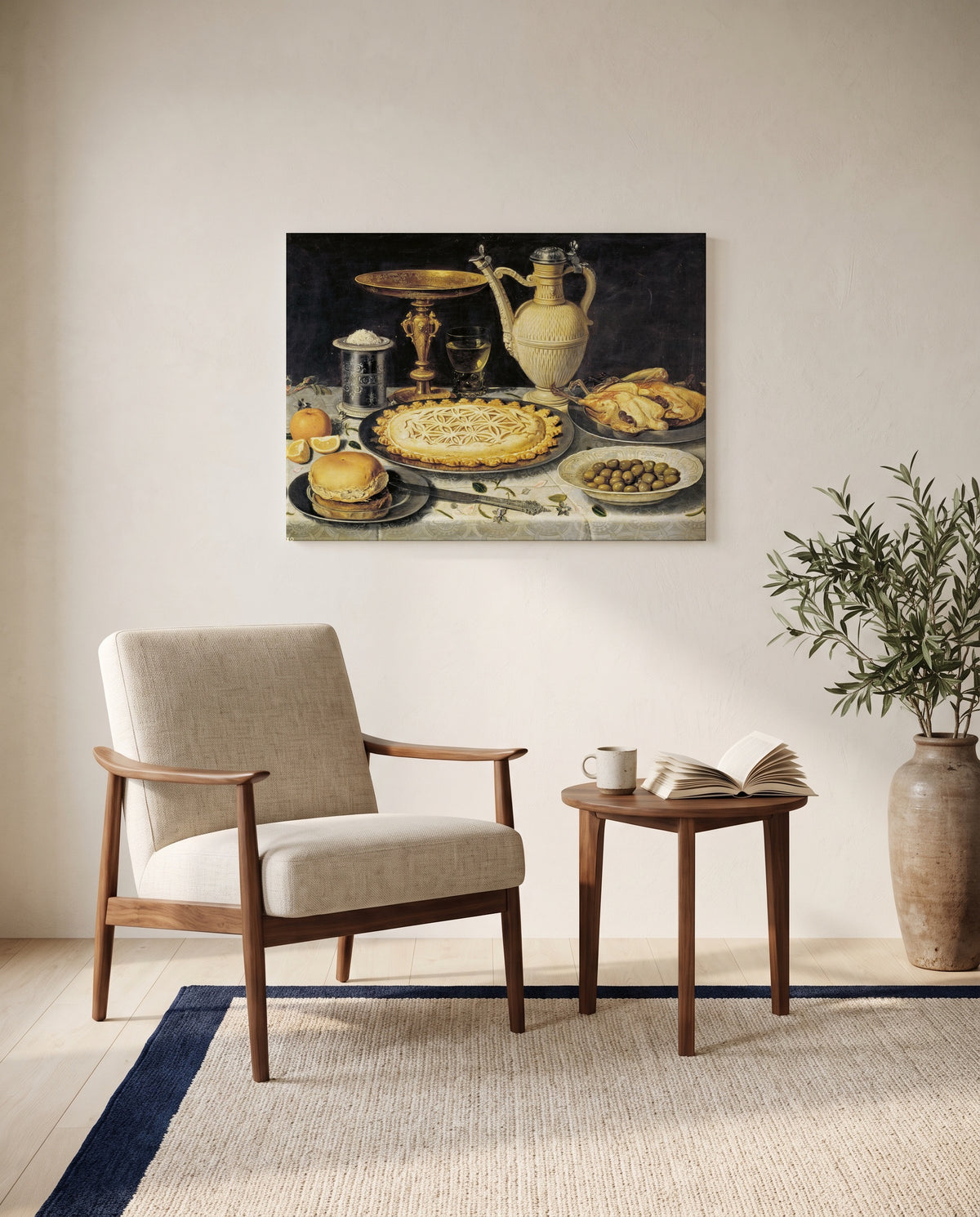 Tazza, Jug and Pie by Clara Peeters as a stretched canvas above a linen lounge chair in a reading corner