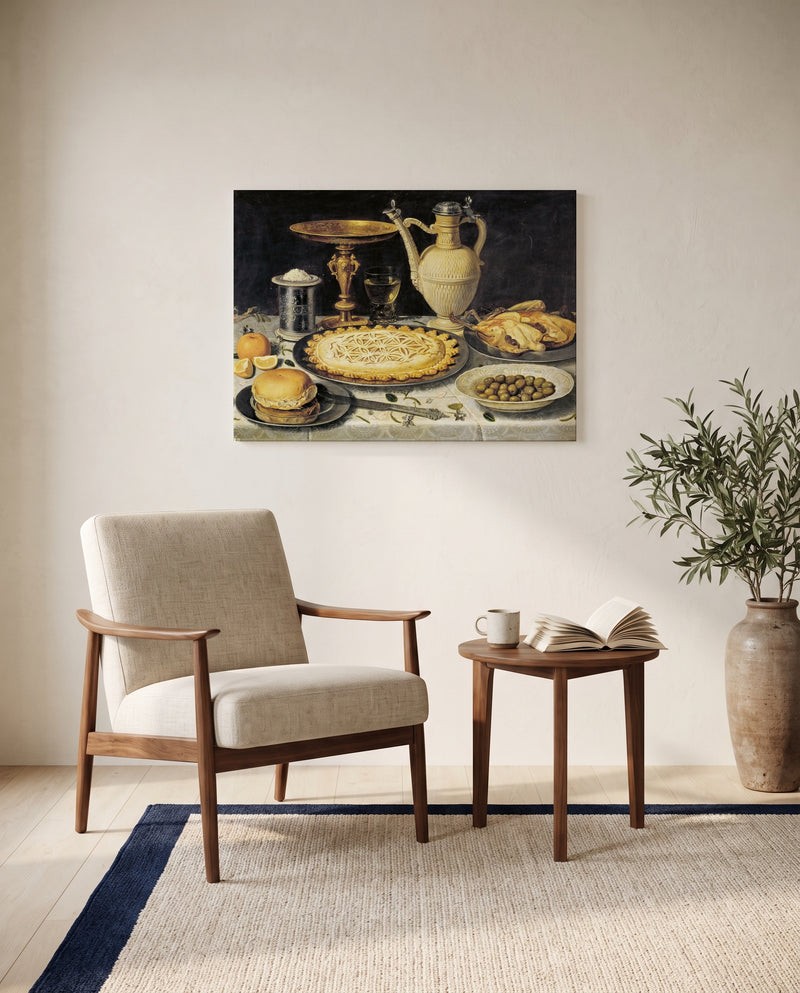 Tazza, Jug and Pie by Clara Peeters as a stretched canvas above a linen lounge chair in a reading corner