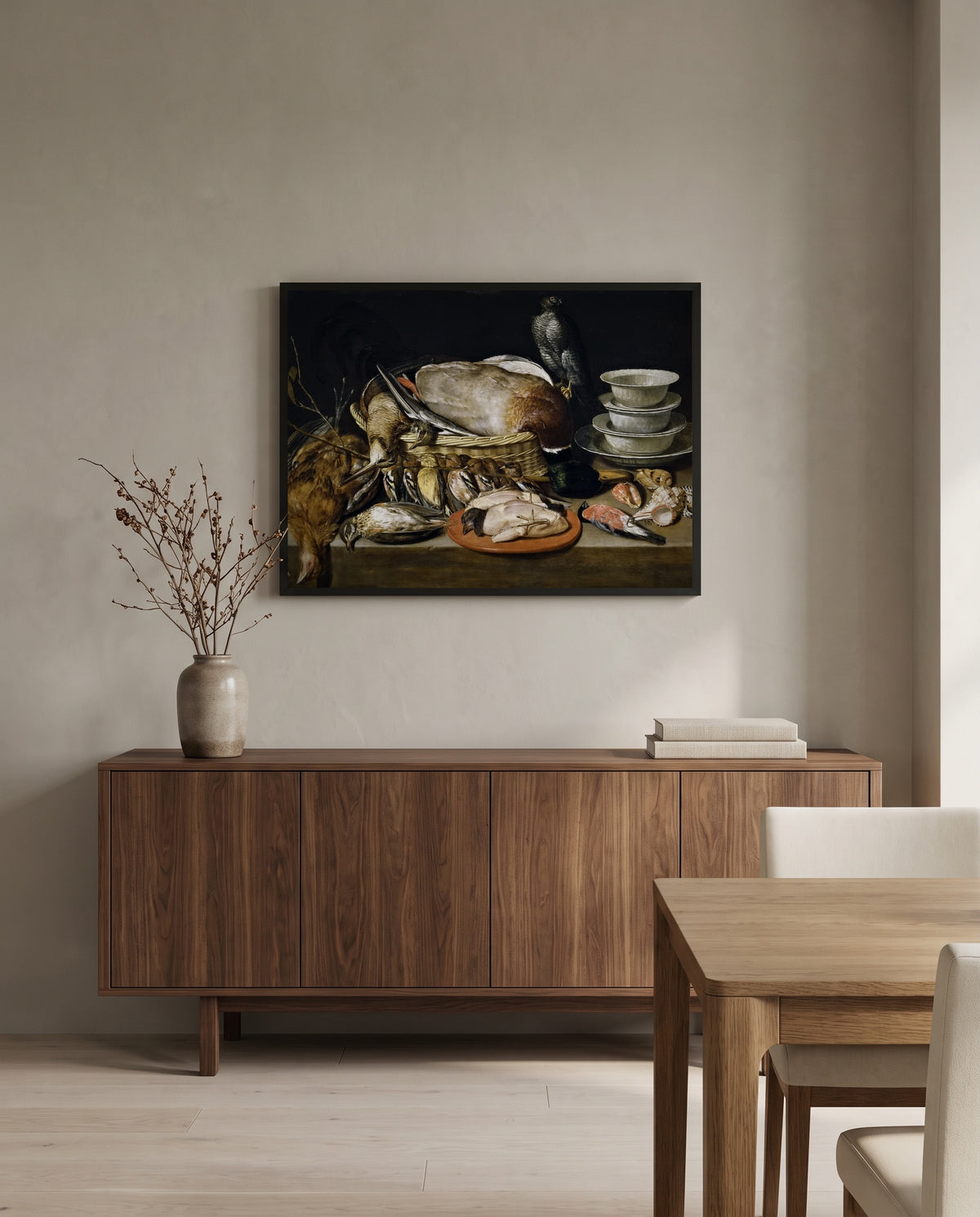 Game and Poultry by Clara Peeters in a black frame above a walnut sideboard in a dining room