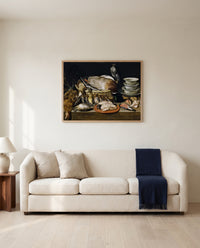 Game and Poultry by Clara Peeters framed in natural oak above a cream sofa in a warm living room