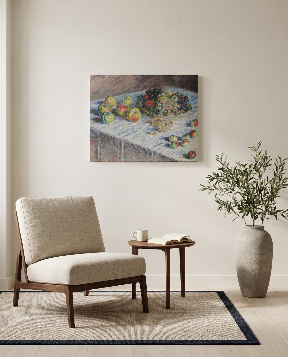 Apples and Grapes by Claude Monet as a stretched canvas above a linen lounge chair in a reading corner