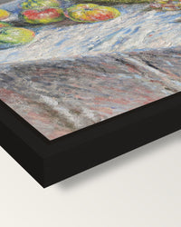 Apples and Grapes by Claude Monet framed canvas, corner close-up: a black floating frame with a shadow gap round the canvas