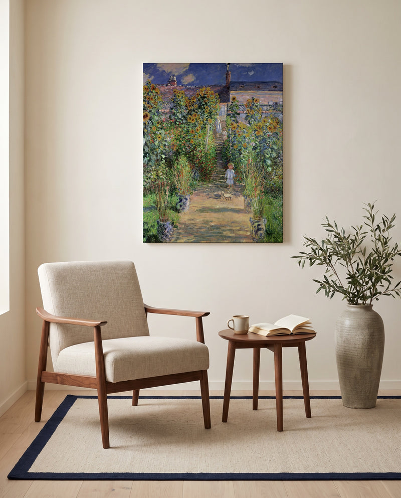 The Artist’s Garden at Vétheuil by Claude Monet as a stretched canvas above a linen lounge chair in a reading corner