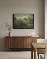 The Artist’s Garden in Argenteuil by Claude Monet in a black frame above a walnut sideboard in a dining room