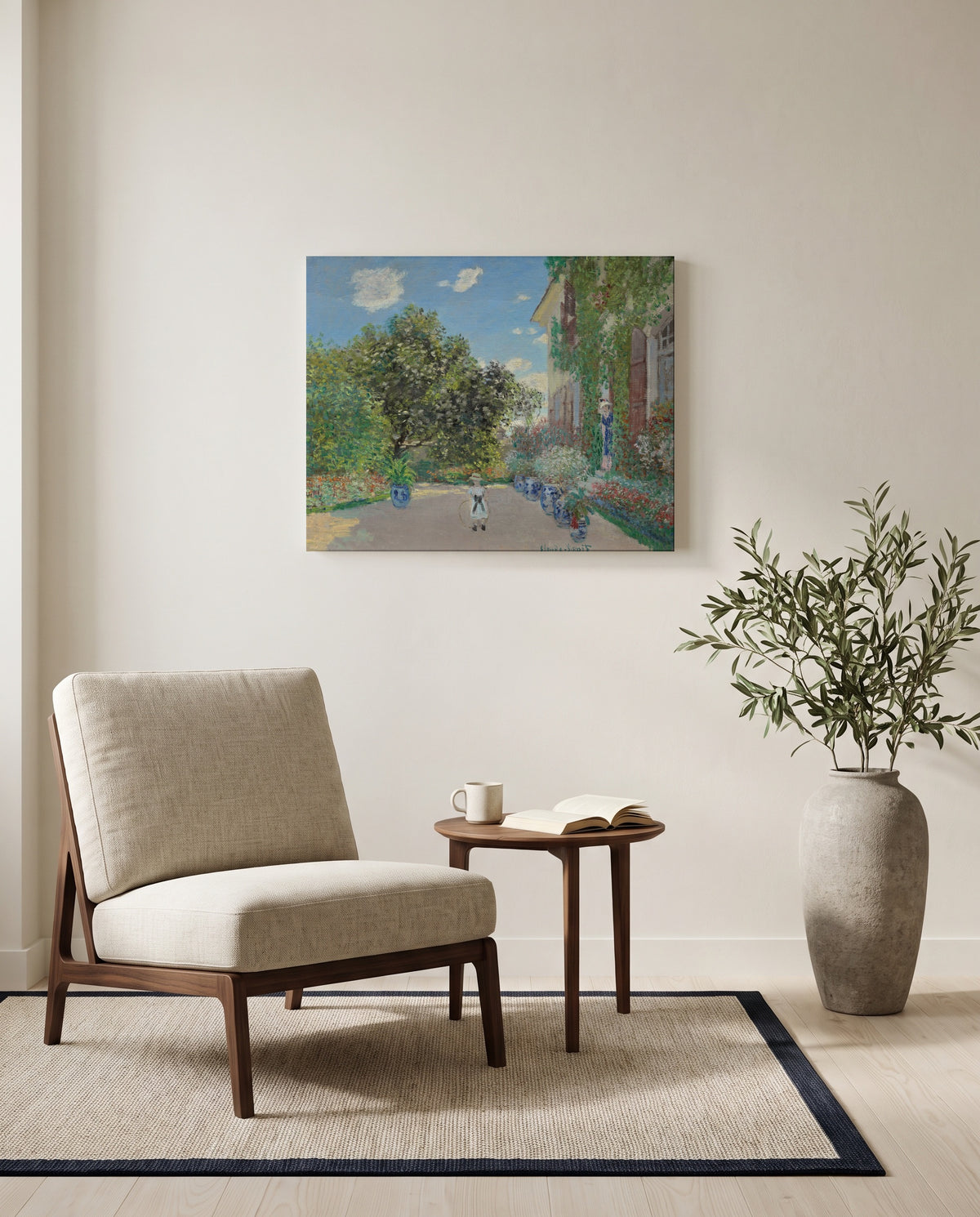 The Artist’s House at Argenteuil by Claude Monet as a stretched canvas above a linen lounge chair in a reading corner