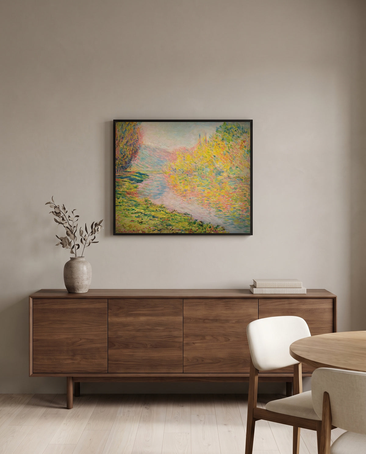 Autumn at Jeufosse by Claude Monet in a black frame above a walnut sideboard in a dining room