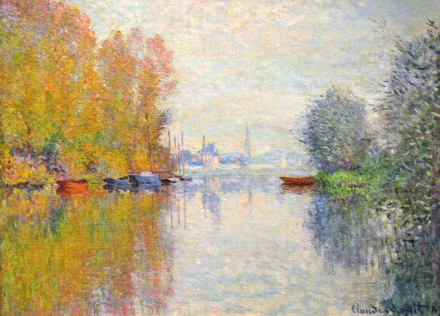 Autumn on the Seine by Claude Monet: golden and orange trees mirrored in a still river, a distant town under a pale sky