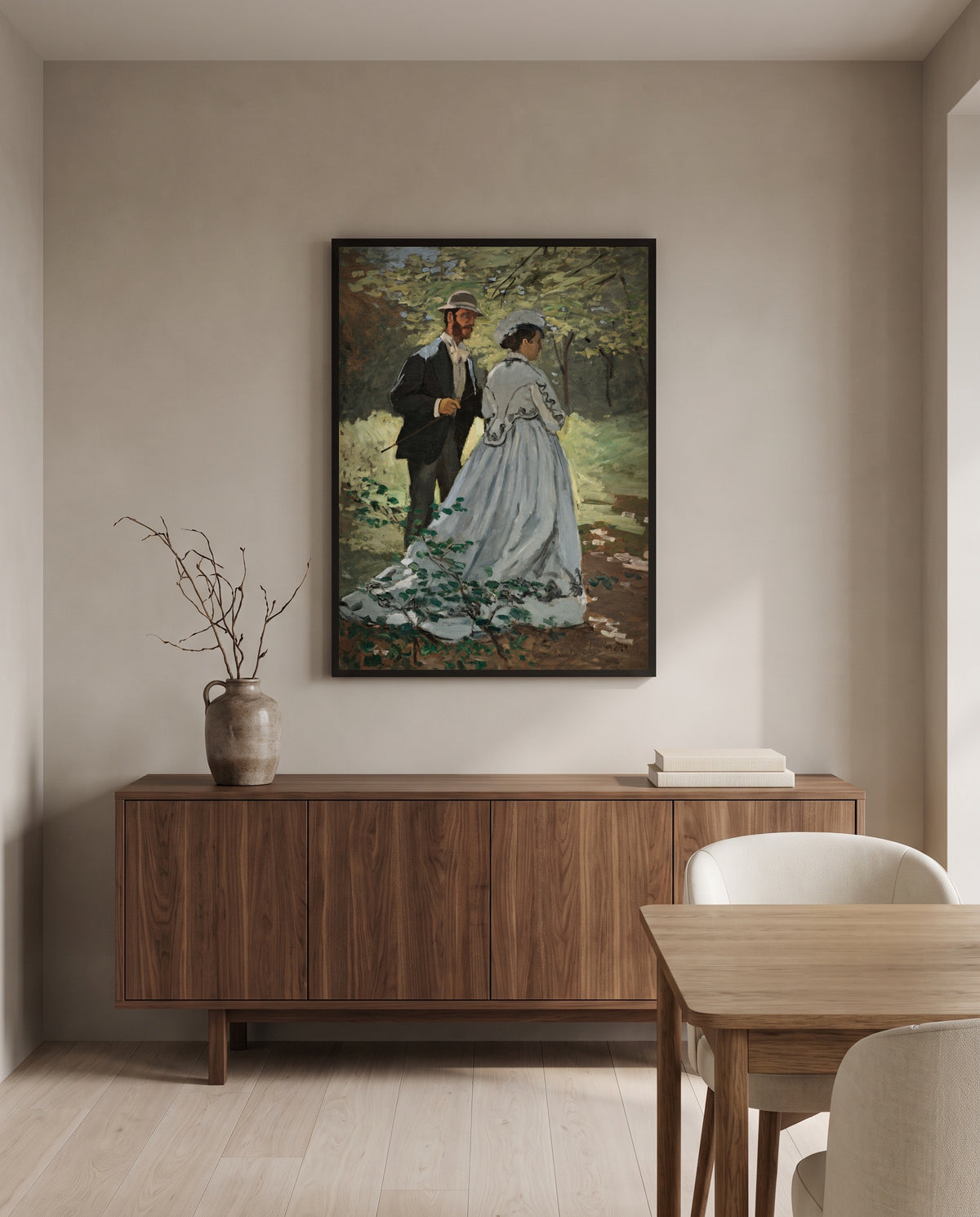 Bazille and Camille by Claude Monet in a black frame above a walnut sideboard in a dining room