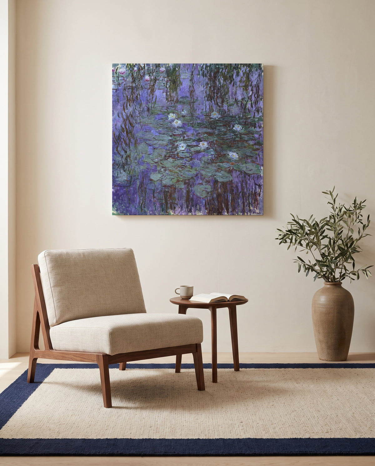 Blue Water Lilies by Claude Monet as a stretched canvas above a linen lounge chair in a reading corner