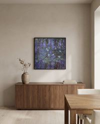Blue Water Lilies by Claude Monet in a black frame above a walnut sideboard in a dining room