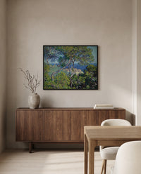 Bordighera by Claude Monet in a black frame above a walnut sideboard in a dining room